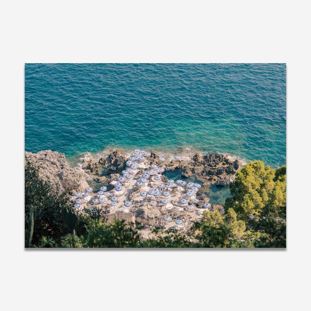 Serene Capri Beach Scene with Coastal Umbrellas and Azure Waters