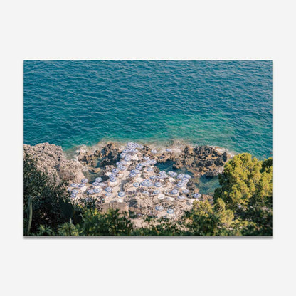 Serene Capri Beach Scene with Coastal Umbrellas and Azure Waters