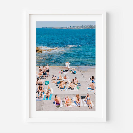 Vibrant Beach Day at Clovelly: Sunbathers by the Ocean