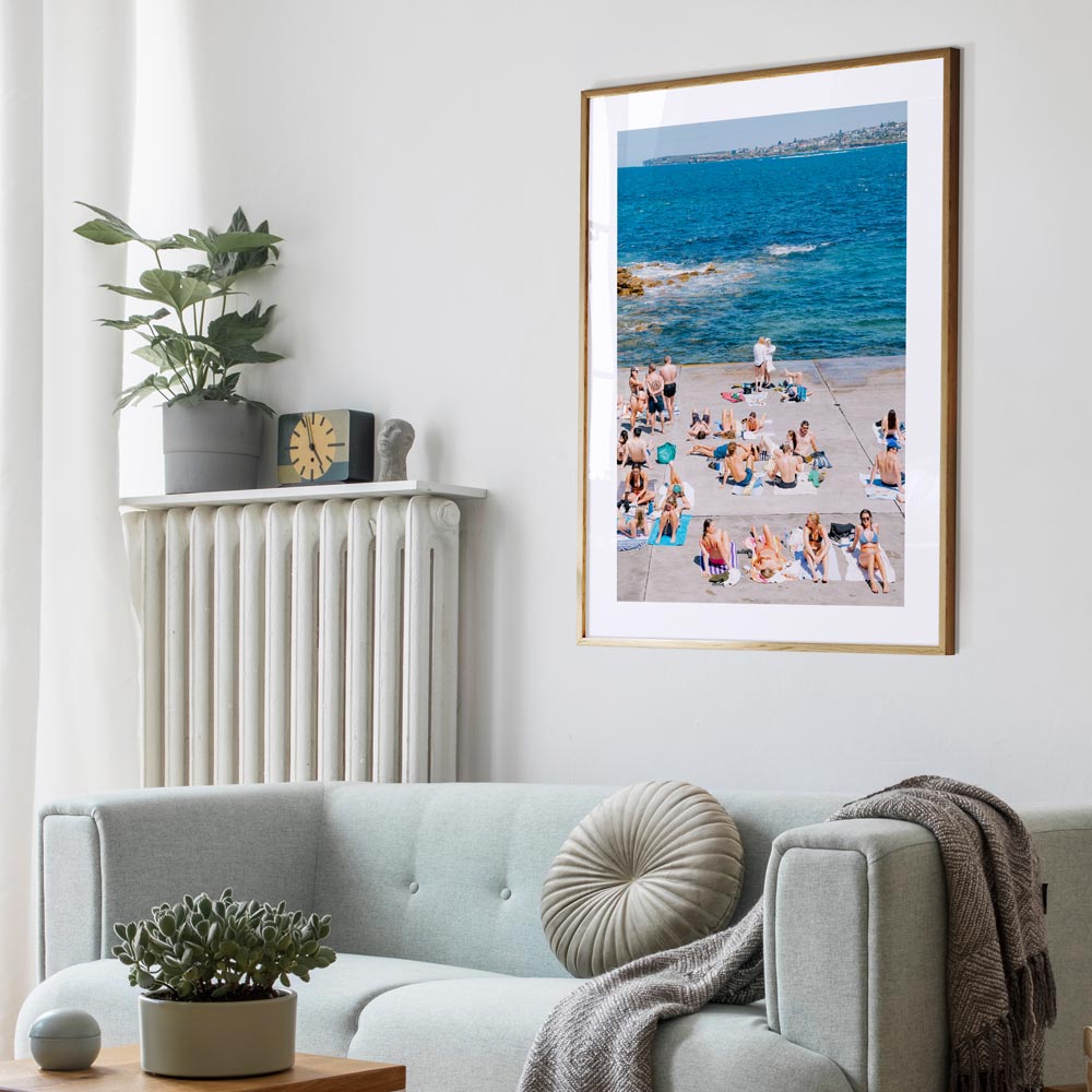 Vibrant Beach Day at Clovelly: Sunbathers by the Ocean