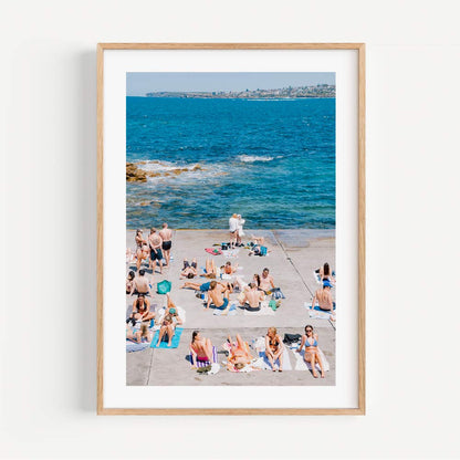 Vibrant Beach Day at Clovelly: Sunbathers by the Ocean