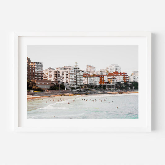 Serene Cronulla Beach Scene with Coastal Waves and Urban Skyline