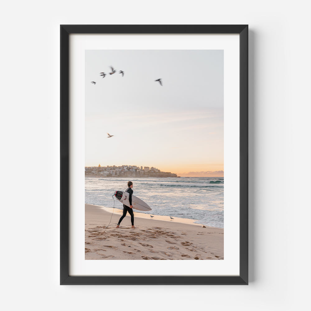 Morning Waves: Surfer Embracing the Dawn at the Beach
