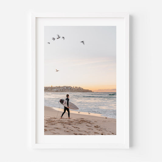 Morning Waves: Surfer Embracing the Dawn at the Beach
