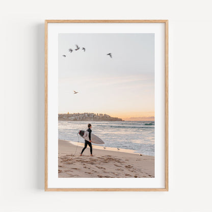 Morning Waves: Surfer Embracing the Dawn at the Beach