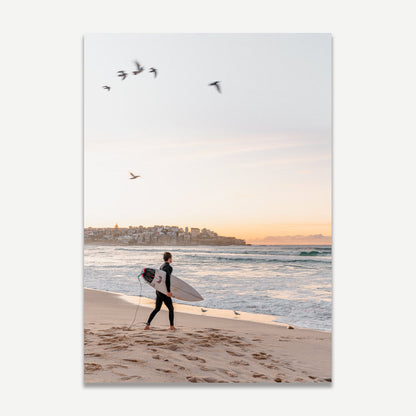 Morning Waves: Surfer Embracing the Dawn at the Beach