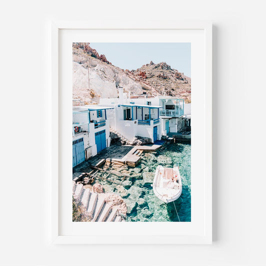 Charming Firopotamos Coastal Scene with Tranquil Waters and Vibrant Architecture