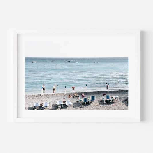 Serene Beach Scene with Bathers and Tranquil Waves in Beautiful Coastal Landscape