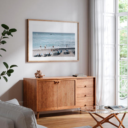 Serene Beach Scene with Bathers and Tranquil Waves in Beautiful Coastal Landscape