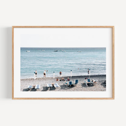 Serene Beach Scene with Bathers and Tranquil Waves in Beautiful Coastal Landscape