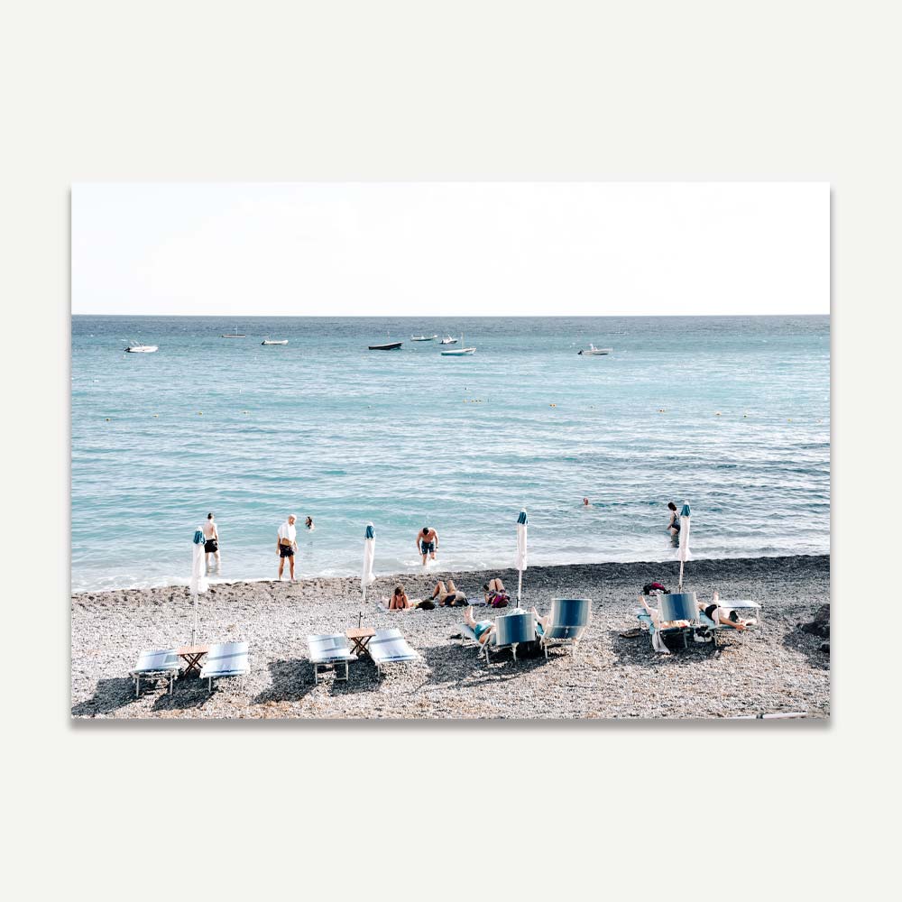 Serene Beach Scene with Bathers and Tranquil Waves in Beautiful Coastal Landscape