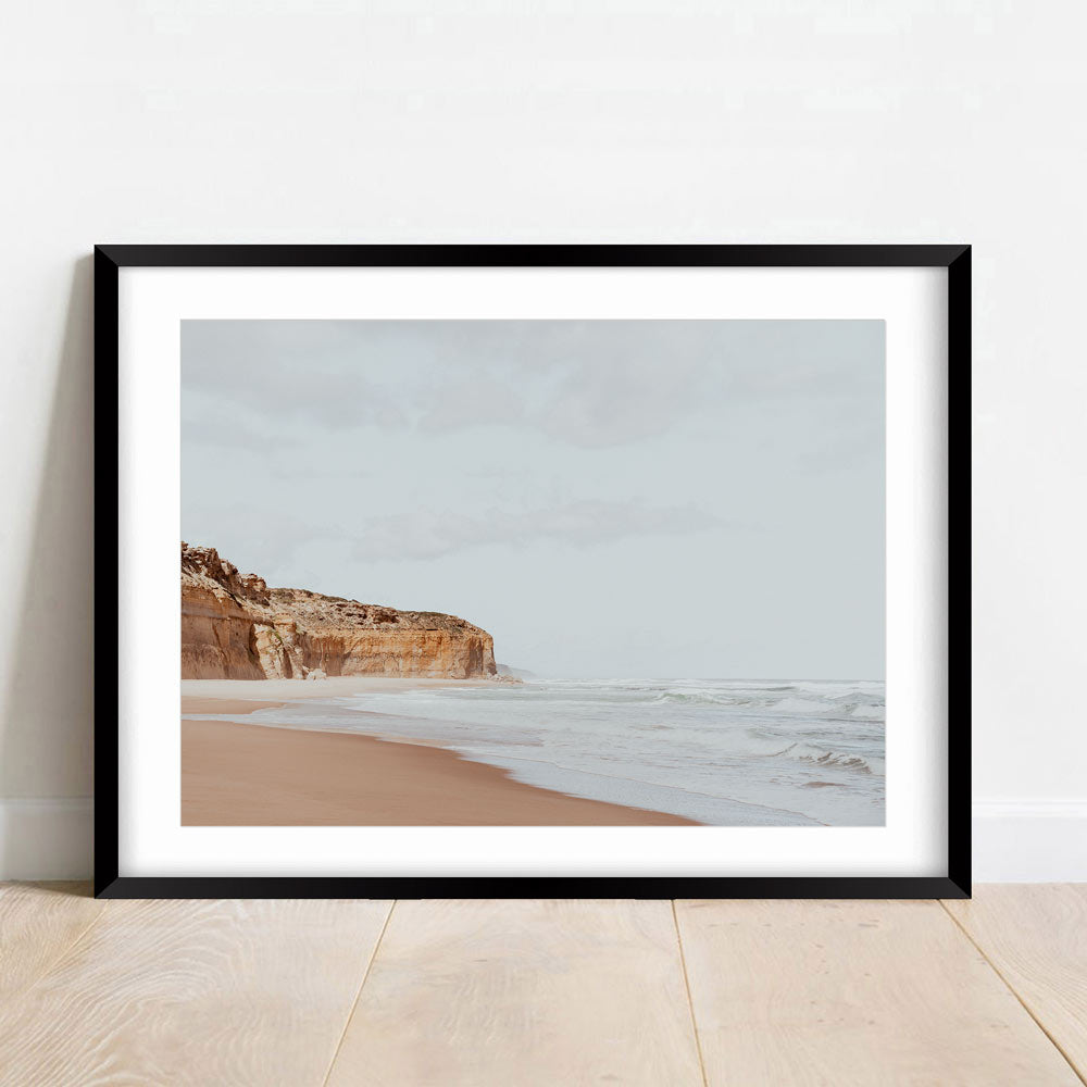 Serene Coastal Landscape with Cliffs and Gentle Waves in Soft Earth Tones