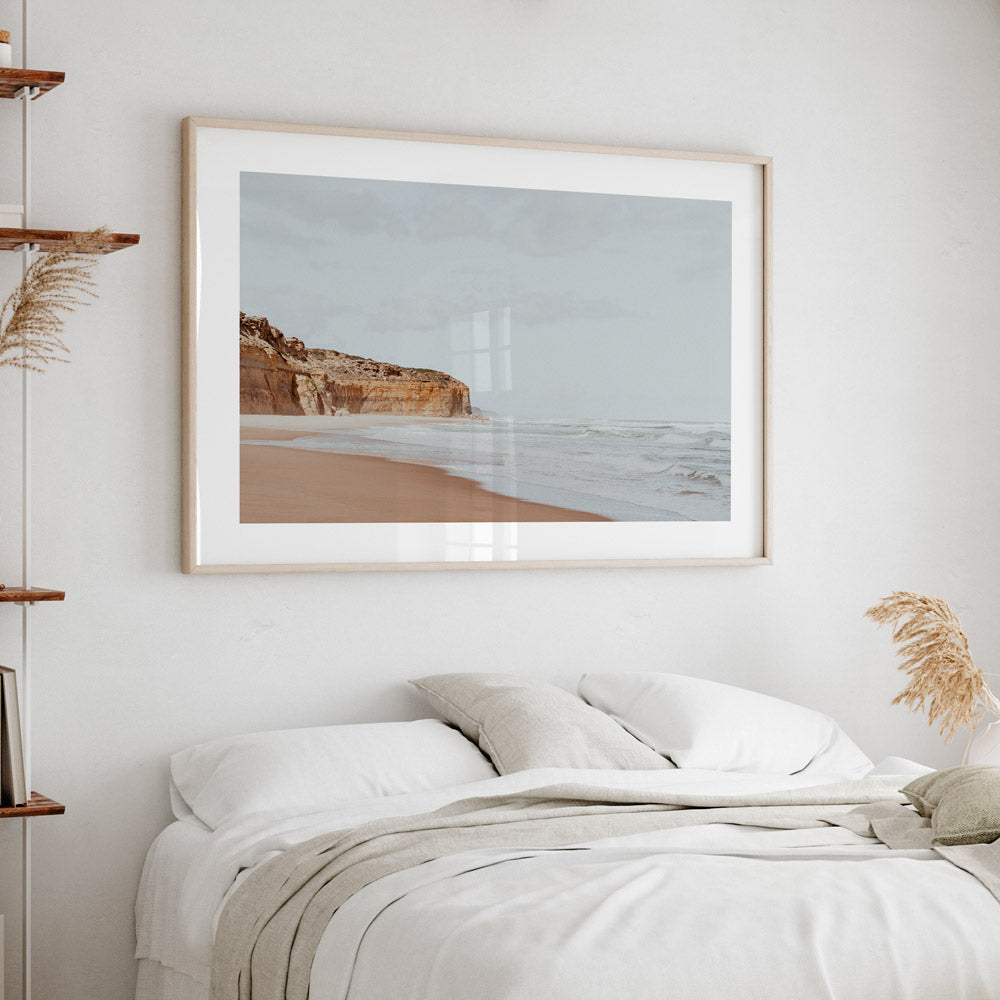 Serene Coastal Landscape with Cliffs and Gentle Waves in Soft Earth Tones