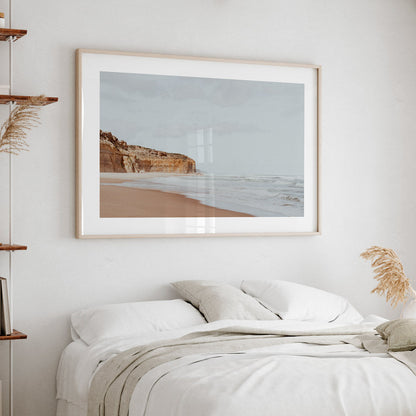 Serene Coastal Landscape with Cliffs and Gentle Waves in Soft Earth Tones