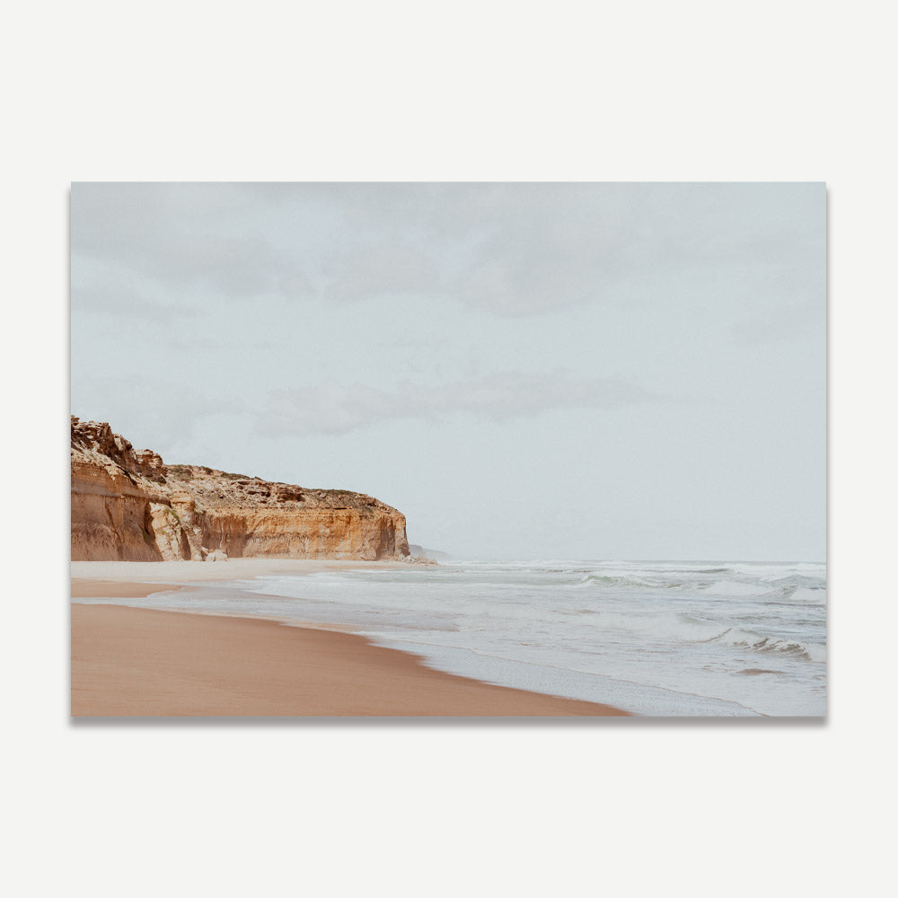 Serene Coastal Landscape with Cliffs and Gentle Waves in Soft Earth Tones