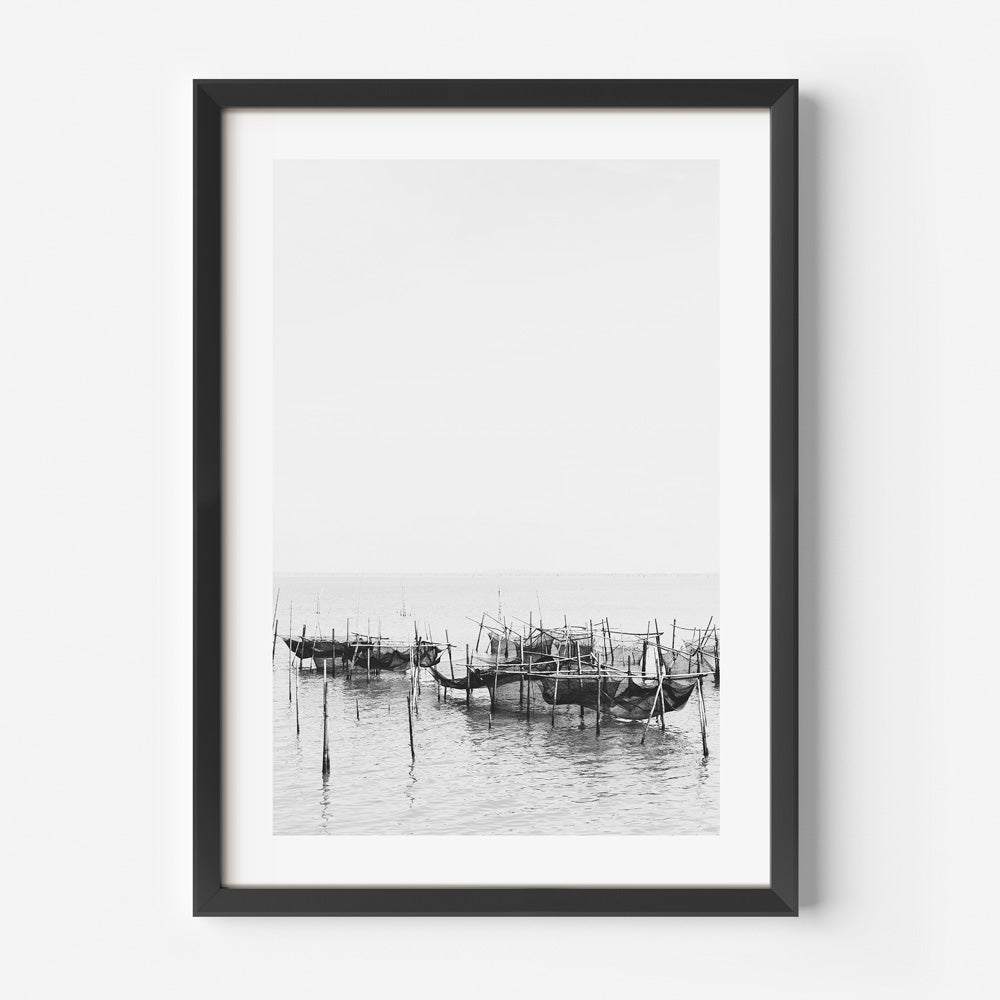 Serene Black and White Oil Painting of Traditional Fishing Boats in Still Waters