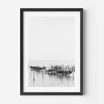 Serene Black and White Oil Painting of Traditional Fishing Boats in Still Waters