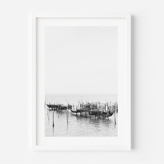 Serene Black and White Oil Painting of Traditional Fishing Boats in Still Waters