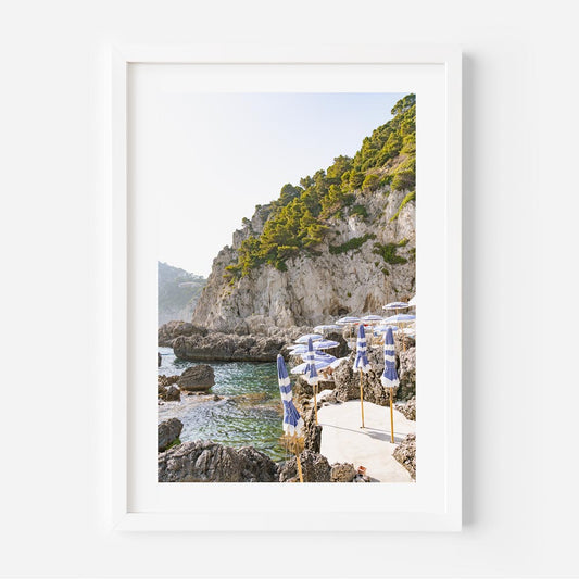 Serene Coastal Escape with Umbrellas and Crystal Waters