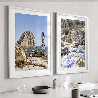 Charming Coastal Retreat: Serene Beach Scene with Umbrellas and Rock Formation