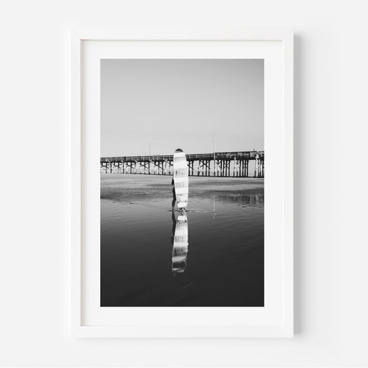 Black and White Longboard Surfer Reflection at Ocean Pier Sunset