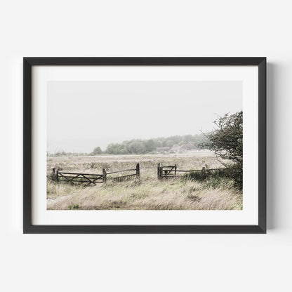 Serene Landscape with Open Gate and Lush Green Meadows in Soft Pastel Tones