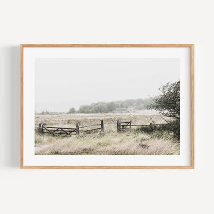 Serene Landscape with Open Gate and Lush Green Meadows in Soft Pastel Tones