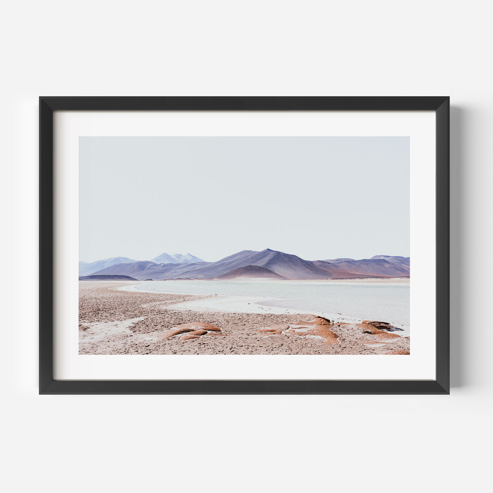 Stunning Red Rock Desert Landscape with Majestic Mountains and Serene Waters