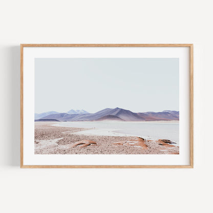 Stunning Red Rock Desert Landscape with Majestic Mountains and Serene Waters