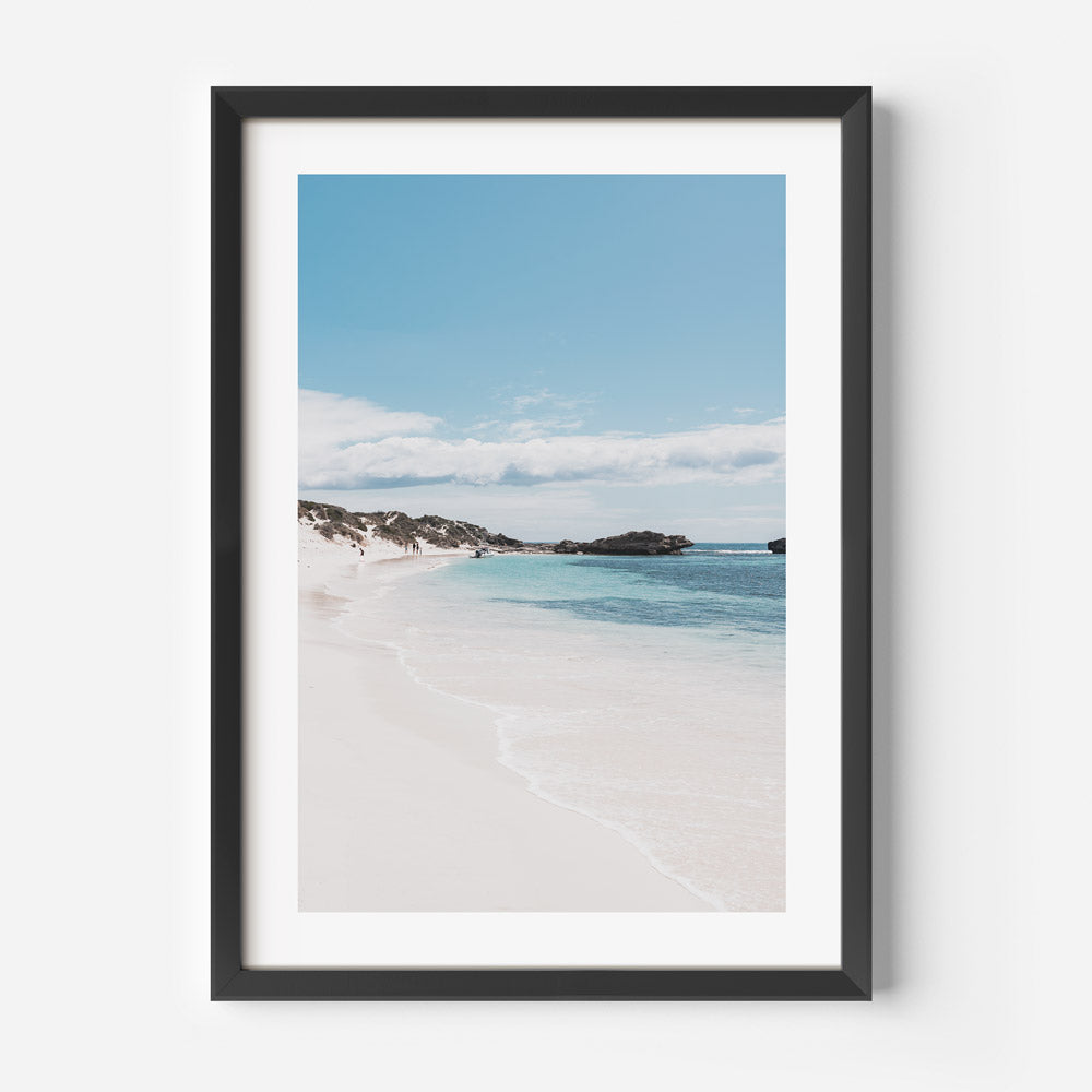 Tranquil Beachscape with Blue Waters and Serene Sky