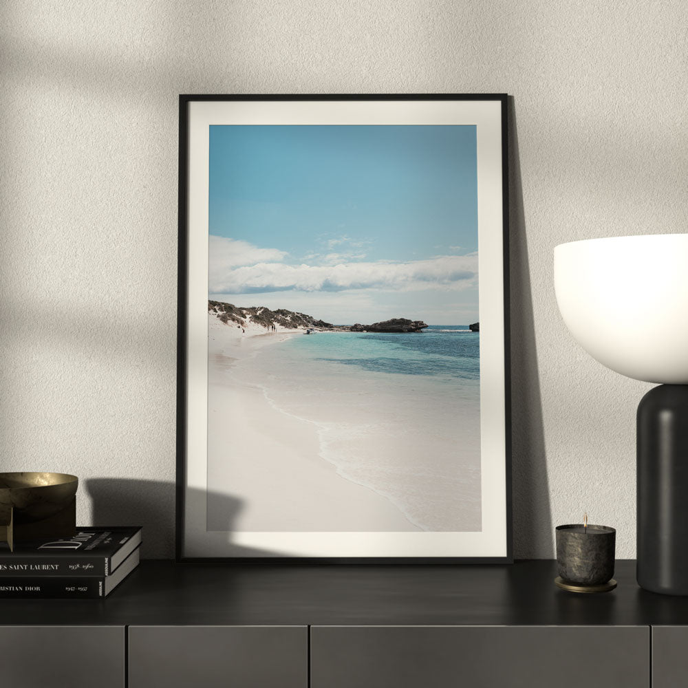 Tranquil Beachscape with Blue Waters and Serene Sky