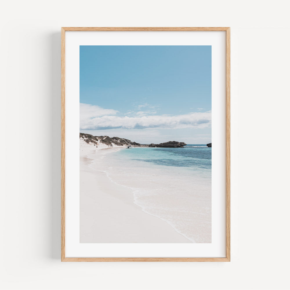 Tranquil Beachscape with Blue Waters and Serene Sky
