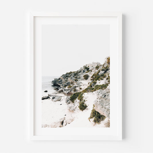 Serene Coastal Cliff with Parakeet Overlooking Tranquil Bay