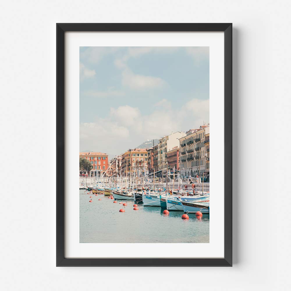 Serene Port Lympia Coastal Scene with Colorful Boats and Charming Waterfront
