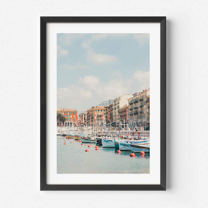 Serene Port Lympia Coastal Scene with Colorful Boats and Charming Waterfront