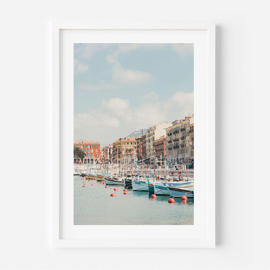 Serene Port Lympia Coastal Scene with Colorful Boats and Charming Waterfront