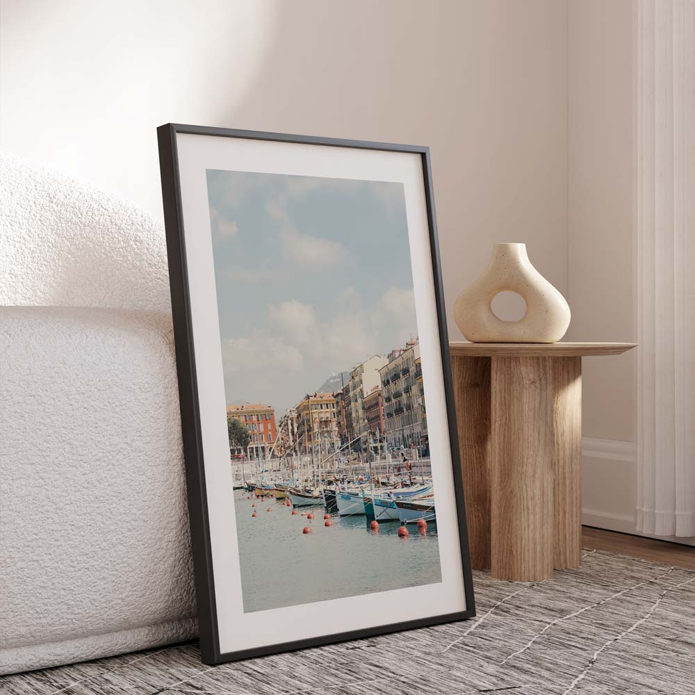 Serene Port Lympia Coastal Scene with Colorful Boats and Charming Waterfront