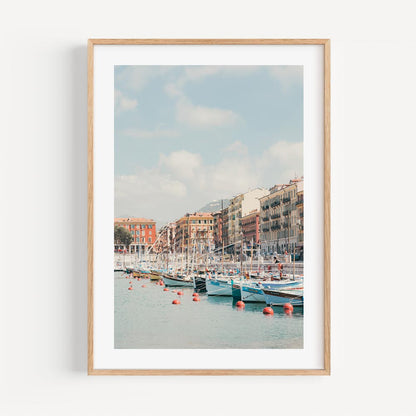 Serene Port Lympia Coastal Scene with Colorful Boats and Charming Waterfront