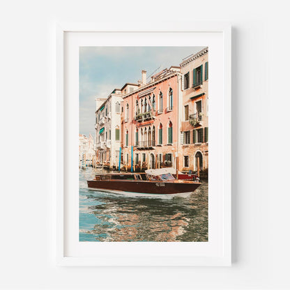 Venetian Waterway Serenity: Charming Boat on Canals with Historic Buildings