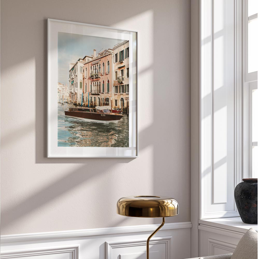Venetian Waterway Serenity: Charming Boat on Canals with Historic Buildings