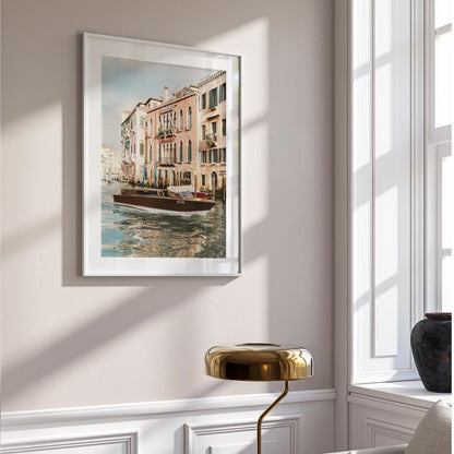 Venetian Waterway Serenity: Charming Boat on Canals with Historic Buildings