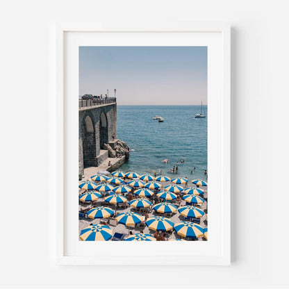 Vibrant Beach Scene with Colorful Umbrellas and Serene Ocean Views
