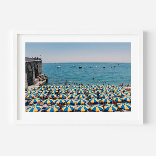 Vibrant Beach Scene with Colorful Umbrellas and Serene Ocean View