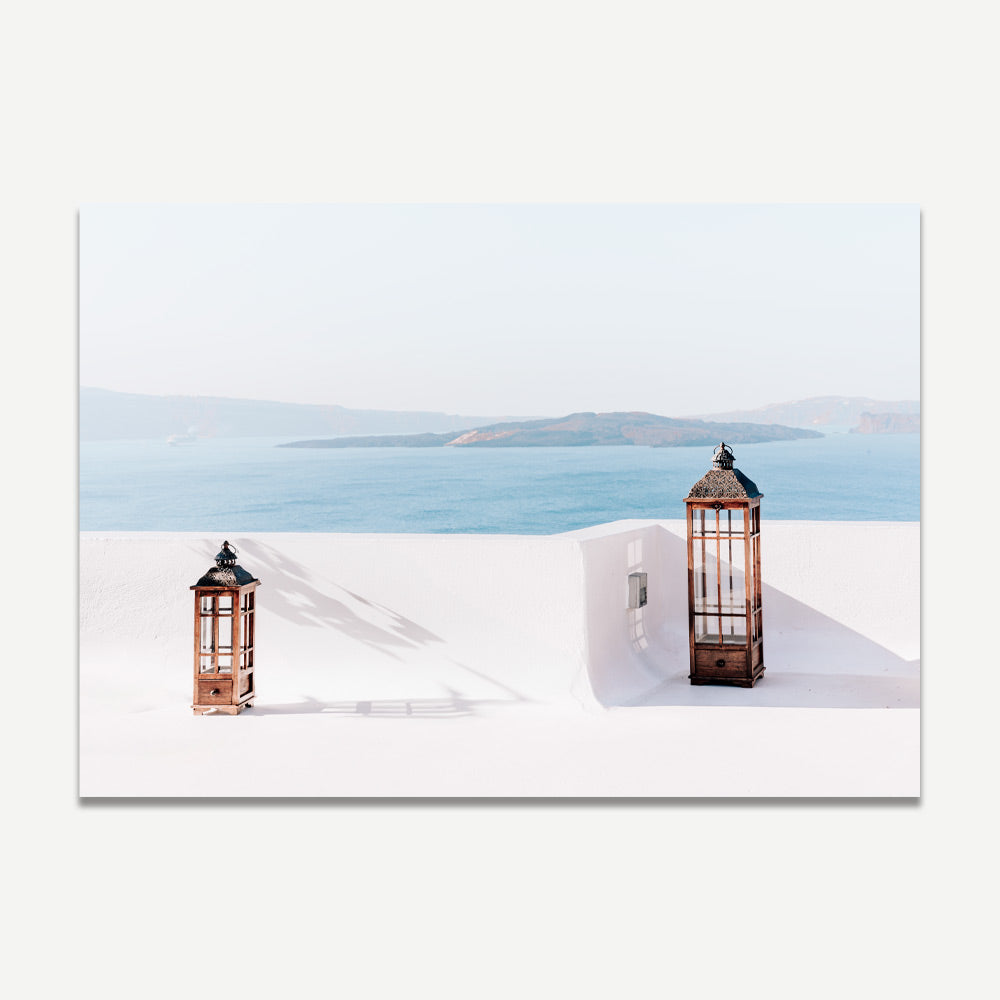 Serene Coastal View with Two Elegant Lanterns Igniting Tranquility