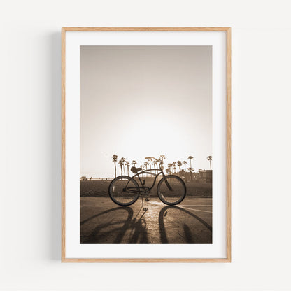 Serene Sunset: Classic Bicycle by the Beach with Palm Trees
