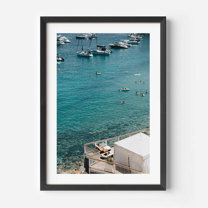 Serene Catalina Beach Scene with Bathers and Moored Boats