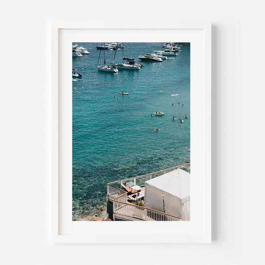 Serene Catalina Beach Scene with Bathers and Moored Boats