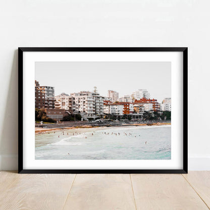 Serene Cronulla Beach Scene with Coastal Waves and Urban Skyline