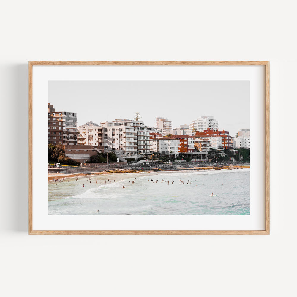 Serene Cronulla Beach Scene with Coastal Waves and Urban Skyline