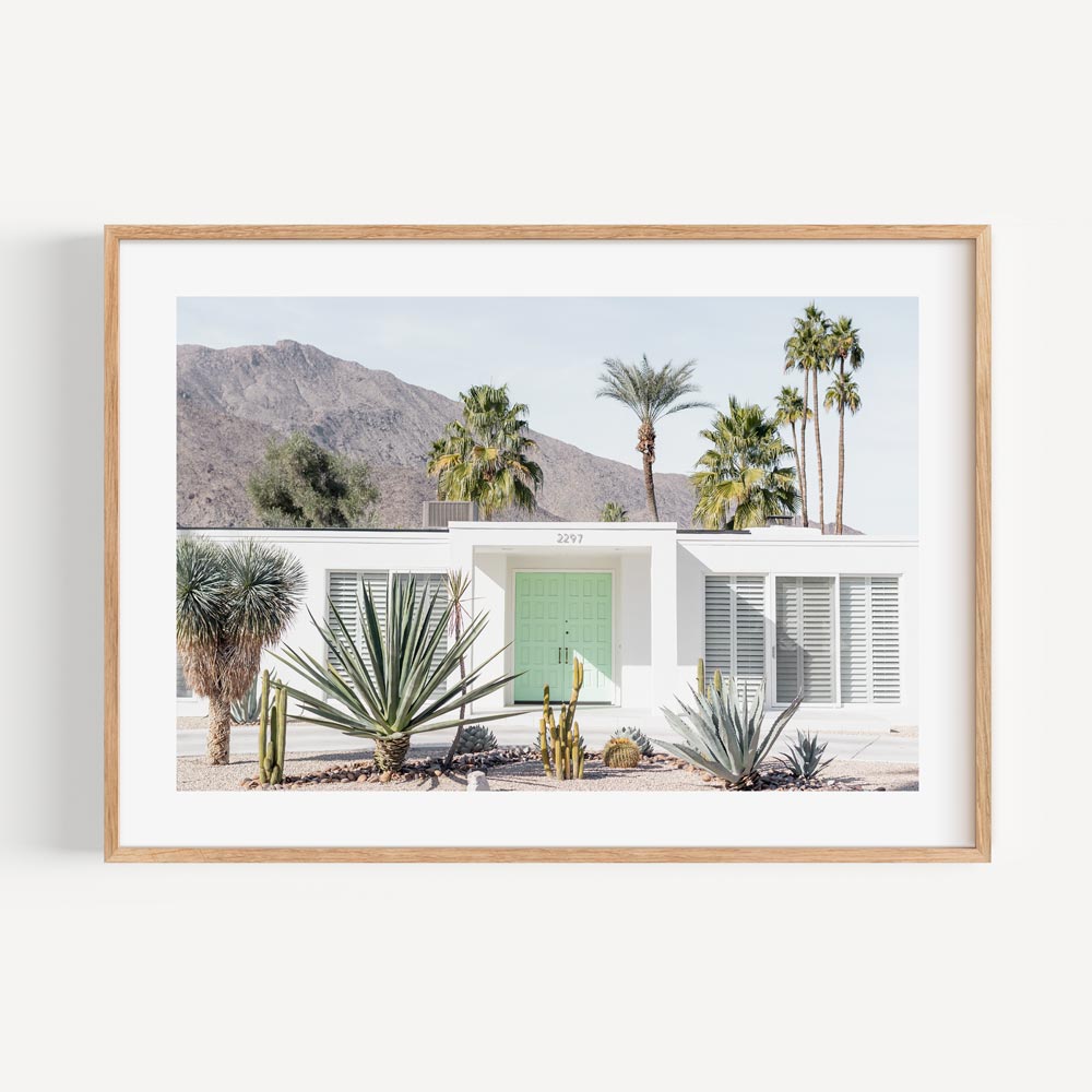 Serene Mint Green Door with Palm Oasis in Modern Desert Landscape